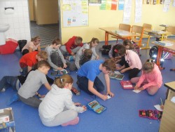 Draw the small green dinosaur.